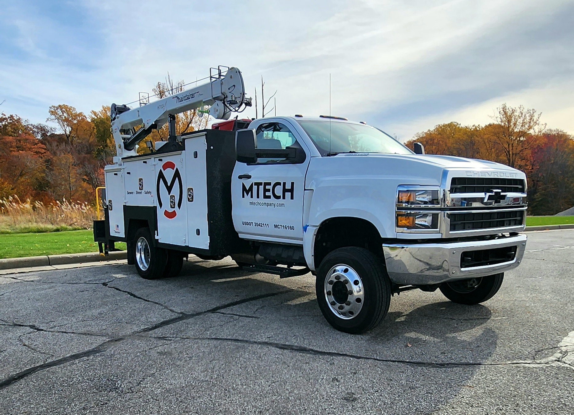 MapleTech Mechanical service truck parked at a Toronto home